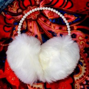 Original and new white ear muffs